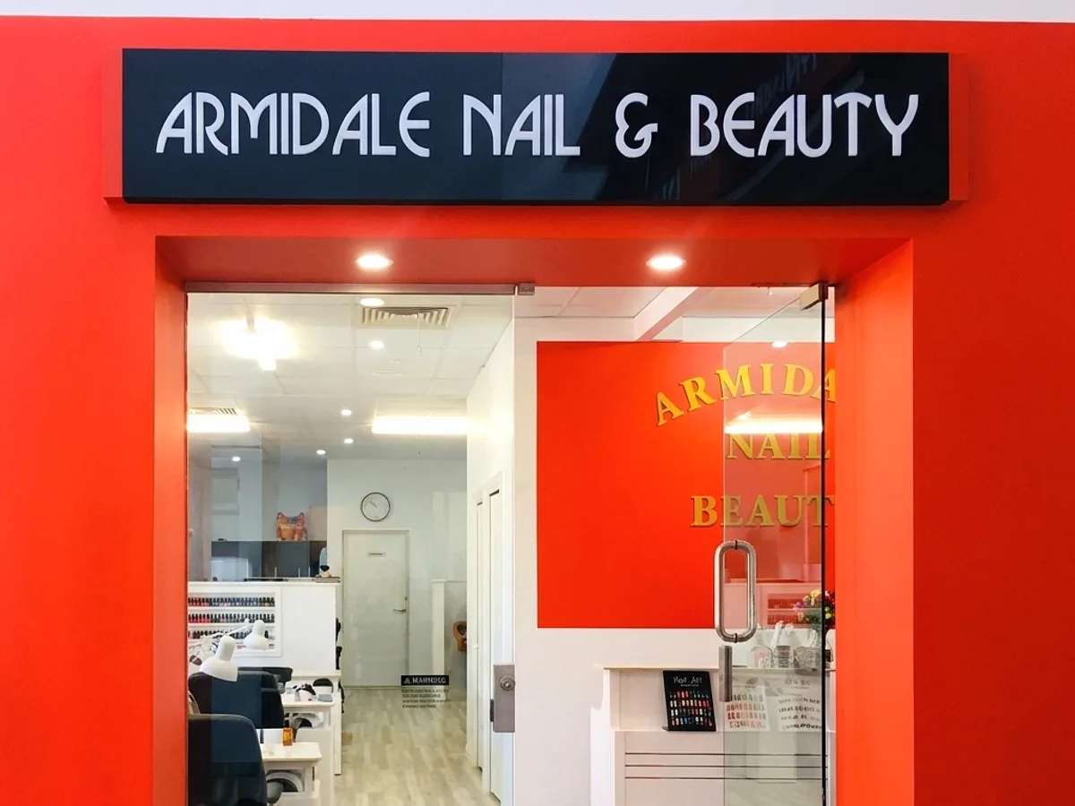 Storefront of Armidale Nail and Beauty inside Armidale Plaza, with the salon interior visible through the entrance