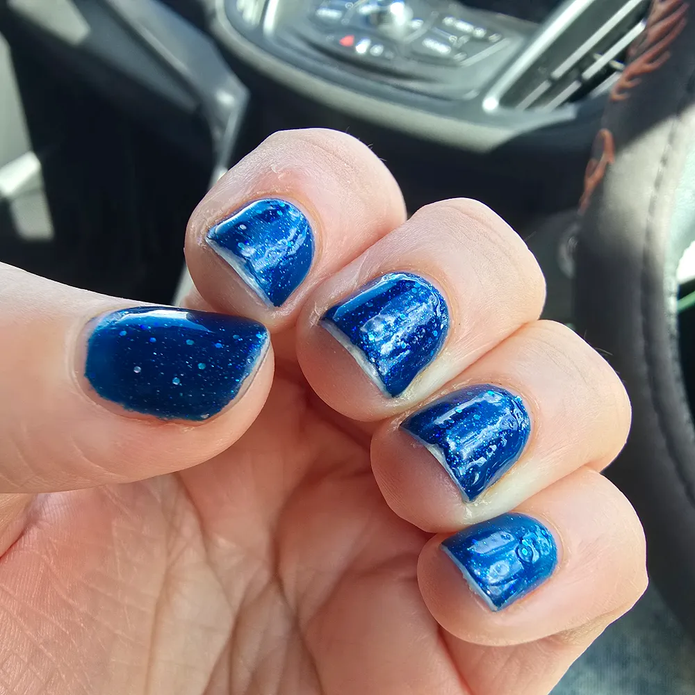 Deep blue glitter gel nails