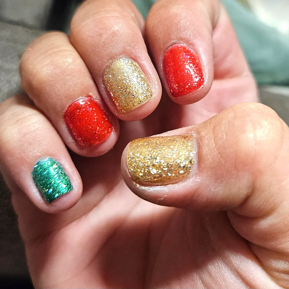 Festive red, gold and green glitter nails