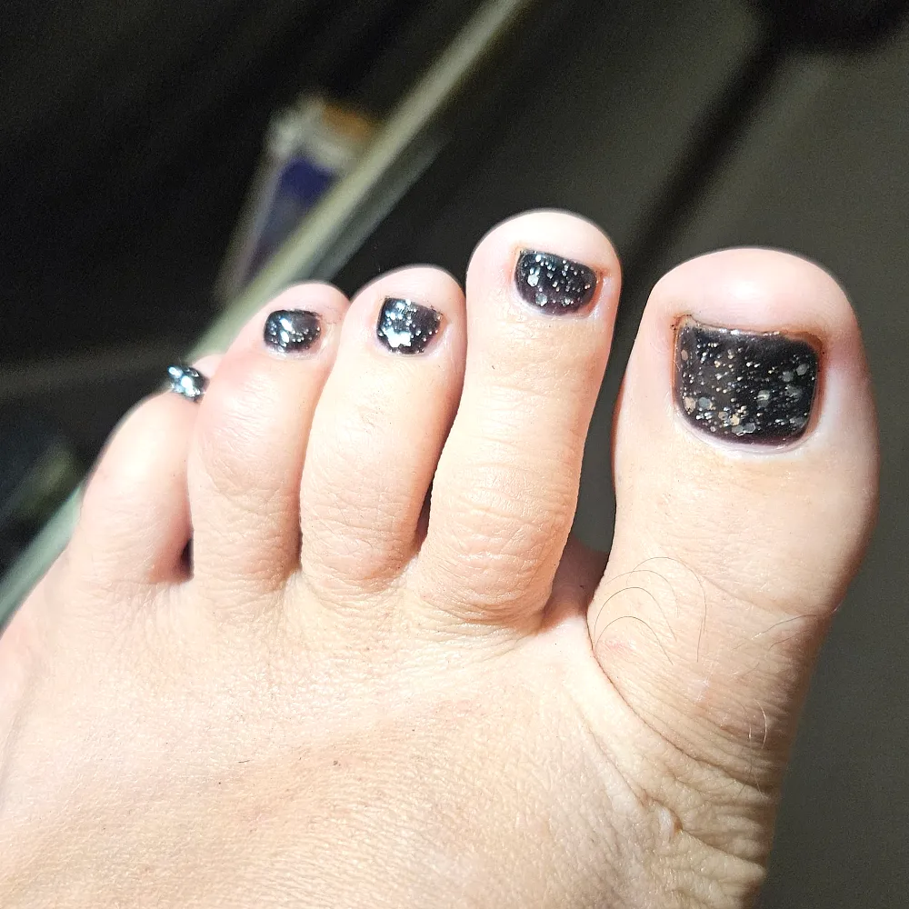 Black glitter pedicure